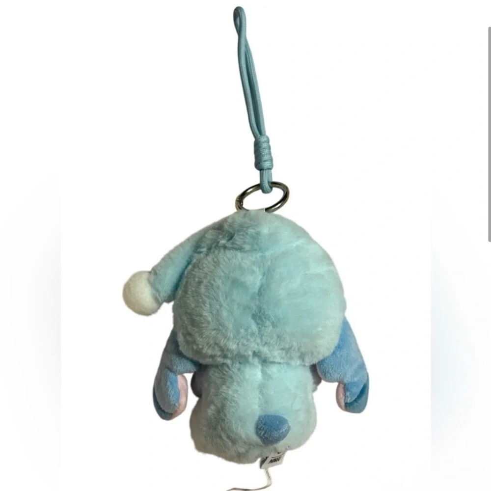 Disney MINISO Stitch Eat Something Before
Sleep Vinyl Plush KeychainSleepy Donut - Picture 3 of 9
